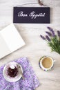 Cup of coffee with dessert and notebook on the table Royalty Free Stock Photo