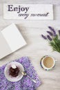 Cup of coffee with dessert and notebook on the table Royalty Free Stock Photo