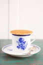 Cup of coffee with a Dutch stroopwafel cookie Royalty Free Stock Photo