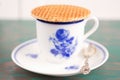 Cup of coffee with a Dutch stroopwafel cookie Royalty Free Stock Photo