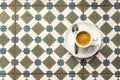 Cup coffee espresso on a ceramic tile floor Royalty Free Stock Photo
