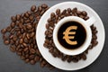 Cup of coffee with euro Royalty Free Stock Photo