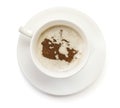 Cup of coffee with foam and powder in the shape of Canada.(series)