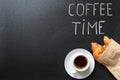 Cup of coffee, fresh croissants and `coffee time` lettering, top view Royalty Free Stock Photo