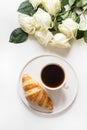 Cup of coffee and freshly baked croissants. Top view. Copy space Royalty Free Stock Photo