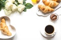 Cup of coffee and freshly baked croissants. Top view. Female breakfast Royalty Free Stock Photo