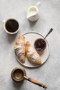 Cup of coffee and freshly baked croissants. Top view. Flat lay. Concept french breakfast Royalty Free Stock Photo