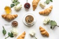 Cup of coffee and freshly baked croissants. Top view. Flat lay. Concept french breakfast Royalty Free Stock Photo