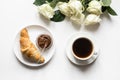 Cup of coffee and freshly baked croissants. Top view. Copy space Royalty Free Stock Photo