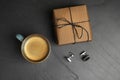 Cup of coffee, gift box and cuff links on table, flat lay. Happy father`s day Royalty Free Stock Photo