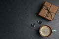 Cup of coffee, gift box and cuff links on table, flat lay with space for text. Happy father`s day Royalty Free Stock Photo