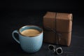 Cup of coffee, gift box and cuff links on table. Happy father`s day Royalty Free Stock Photo