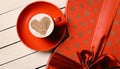 Cup of coffee and gift Royalty Free Stock Photo