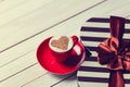 Cup of coffee and gift Royalty Free Stock Photo