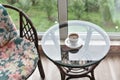 Table, chair, cups and ashtray on hotels balcony Royalty Free Stock Photo