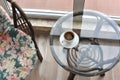 Table, chair, cups and ashtray on hotels balcony Royalty Free Stock Photo