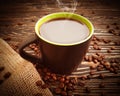 Cup, coffee grain roasted  on wooden background morning caffeine Royalty Free Stock Photo