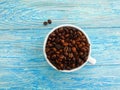 Cup, coffee grain on wooden background morning Royalty Free Stock Photo