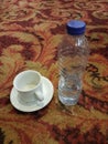 cup coffee and the half water in the botle
