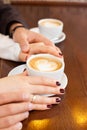 Cup of coffee and hands newlywed Royalty Free Stock Photo