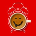 Cup of coffee with happy smiling face and silhouette of alarm clock