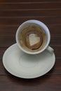 Cup of coffee with Heart of Coffee Grounds on Bar Royalty Free Stock Photo