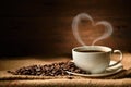 Cup of coffee with heart shape smoke and coffee beans on burlap sack on old wooden background Royalty Free Stock Photo