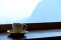 Cup of coffee at hillside with beautiful view of mountain. Royalty Free Stock Photo