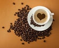 Cup of hot coffee with beans on paper background Royalty Free Stock Photo