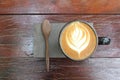 A cup of coffee, Hot cappuccino with milk froth and a wooden spoon. Royalty Free Stock Photo