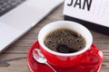 A cup of coffee on the indoor desk