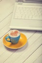 Cup of coffee and laptop Royalty Free Stock Photo