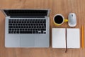 Cup of coffee with laptop, organizer, pencil and mouse Royalty Free Stock Photo