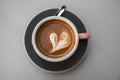 Cup of coffee with a latte art heart design at a cafe in San Sebastian, Spain Royalty Free Stock Photo