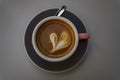 Cup of coffee with a latte art heart design at a cafe in San Sebastian, Spain Royalty Free Stock Photo