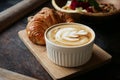 A cup of coffee with latte art on top Royalty Free Stock Photo