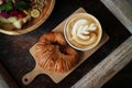 A cup of coffee with latte art on top Royalty Free Stock Photo