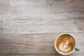 Cup of coffee Latte art  on wooden table, top view,a cup of green pastel.with copy space Royalty Free Stock Photo