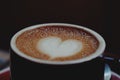 Cup of coffee latte with heart design Royalty Free Stock Photo