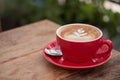 Cup of coffee latte in the morring,red cup Royalty Free Stock Photo