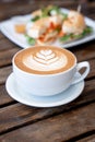 Cup of coffee latte in coffee shop Royalty Free Stock Photo