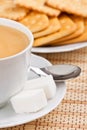 Cup of coffee with a lump sugar and crackers Royalty Free Stock Photo