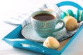 Cup of coffee and macaron cakes on tray Royalty Free Stock Photo