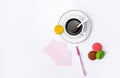 Cup with coffee and macrons, pen and note paper Royalty Free Stock Photo