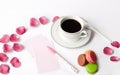 Cup with coffee and macrons, pen and note paper Royalty Free Stock Photo