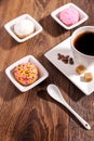 Cup of coffee and marshmallow biscuits with icing colored granu Royalty Free Stock Photo