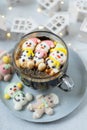 Cup of coffee with marshmallows. Marshmallow snowman in a Santa Claus hat. Winter drink. Christmas sweet food. Top view Royalty Free Stock Photo