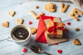 Cup of coffee and a message from a sweet cookie in the form of the word love. Romantic Valentine`s day gift Royalty Free Stock Photo