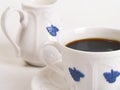 Cup of coffee and milk jug Royalty Free Stock Photo