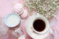 A cup of coffee and a cup of milk on the morning table, dessert and spring flowers Royalty Free Stock Photo